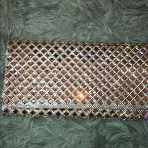 Aldo rose gold clutch.